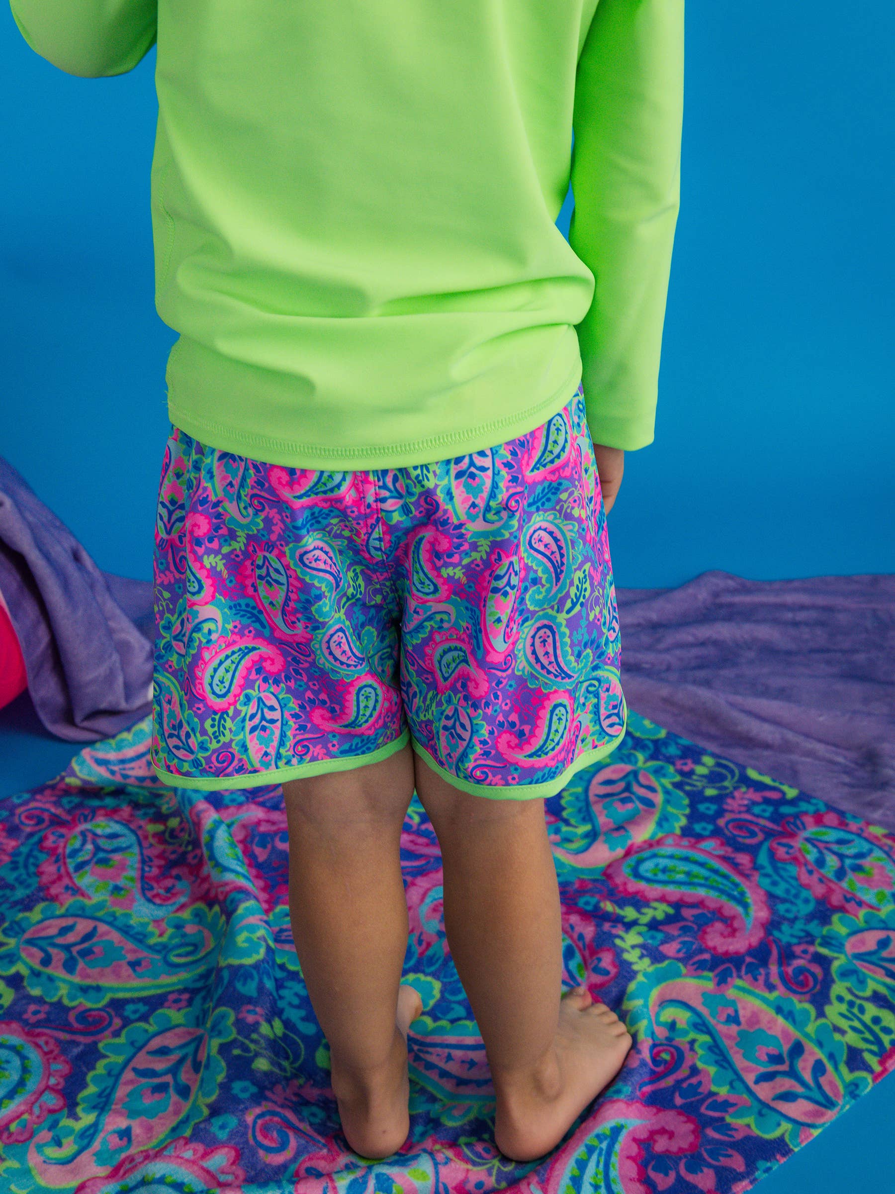 Boys Neon Paisley Pop Performance Hybrid Dolphin Hem Swim Trunks