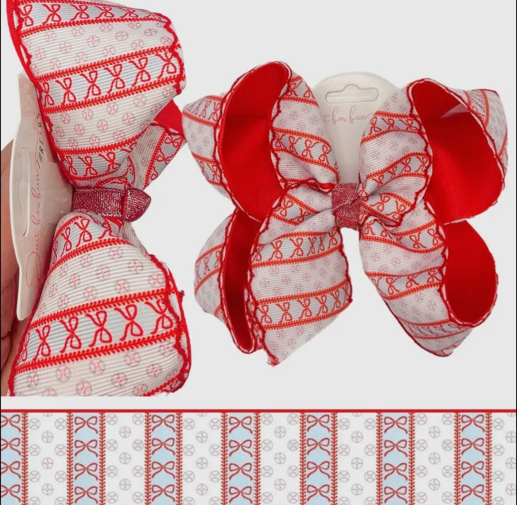 Red and white patterned hair bows on a white background