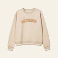Beige sweatshirt with 'MOTHER' text on a beige background